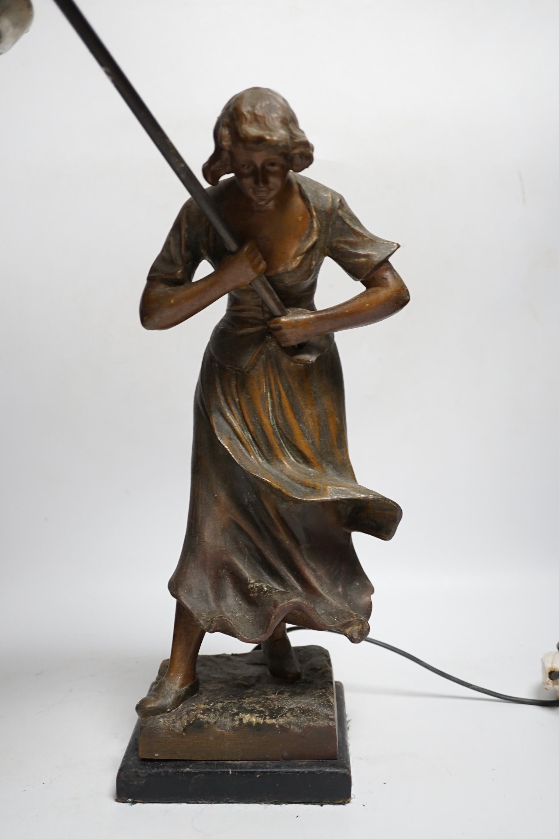 A spelter Art Nouveau-style figural table lamp, lady with an umbrella, 46cm high